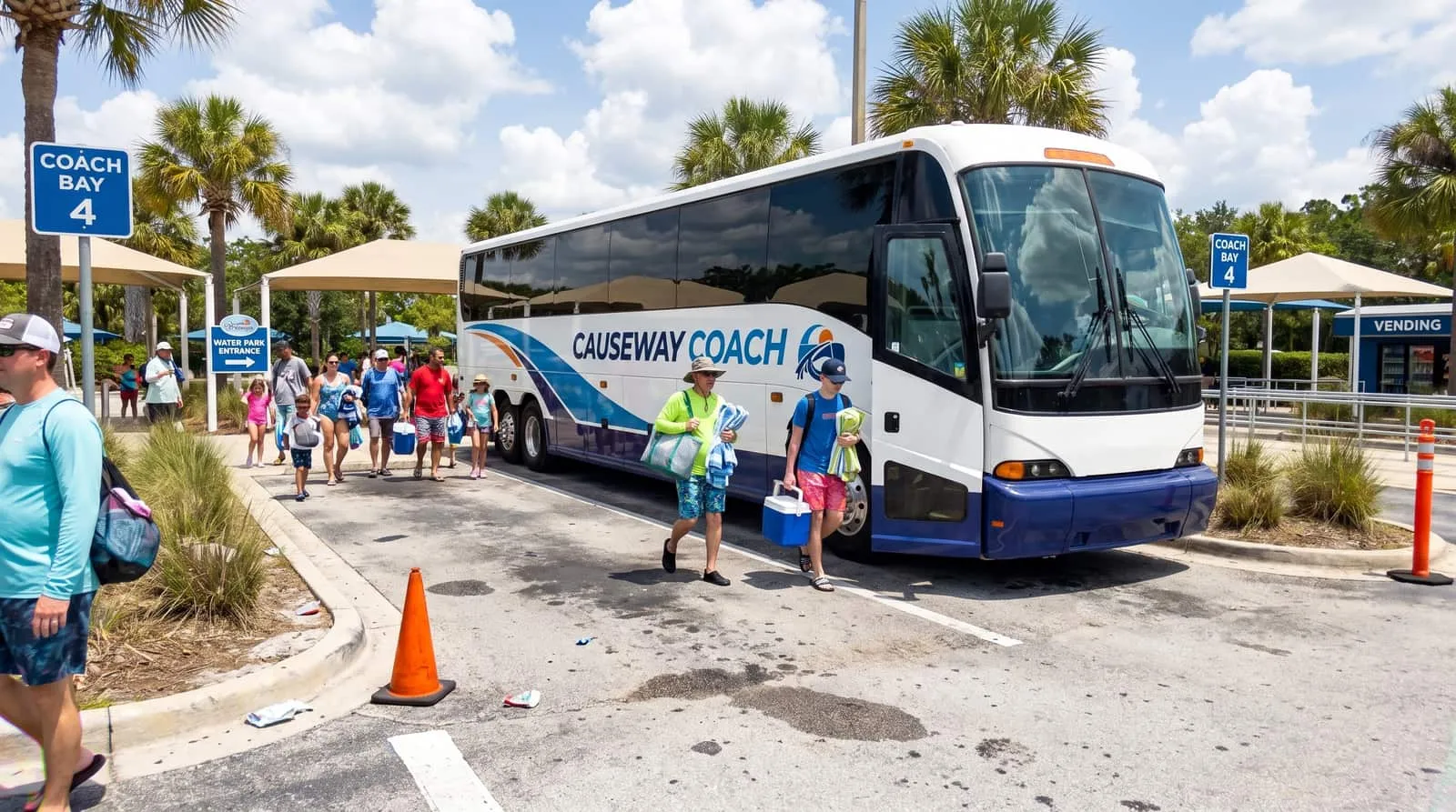 Causeway Coach minibus collecting a youth group for an Orlando water park visit
