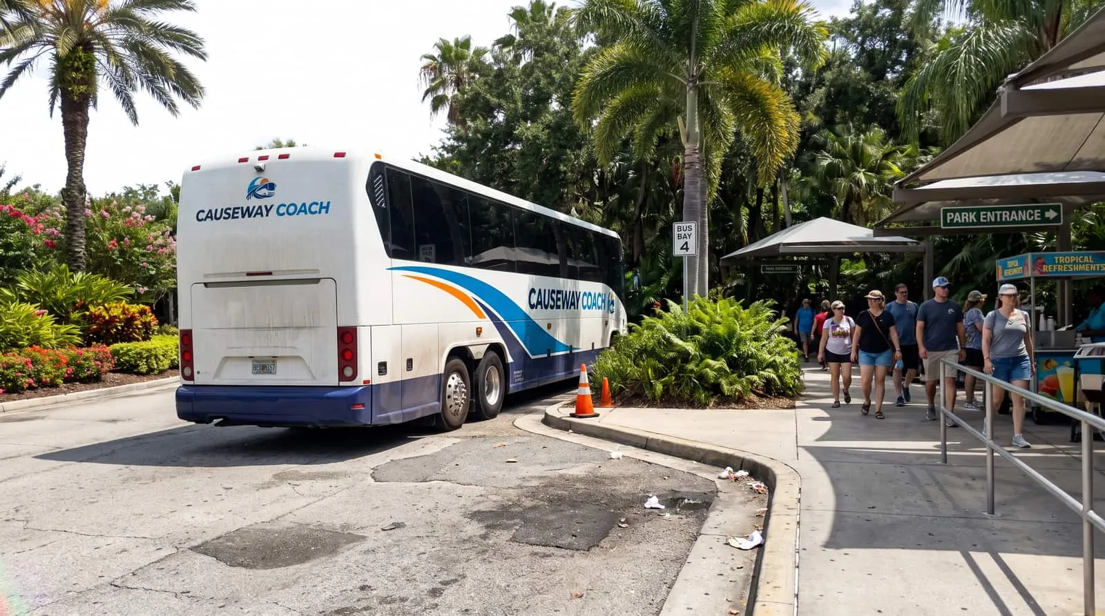 Causeway Coach mid-size coach at an Orlando theme park coach drop-off area