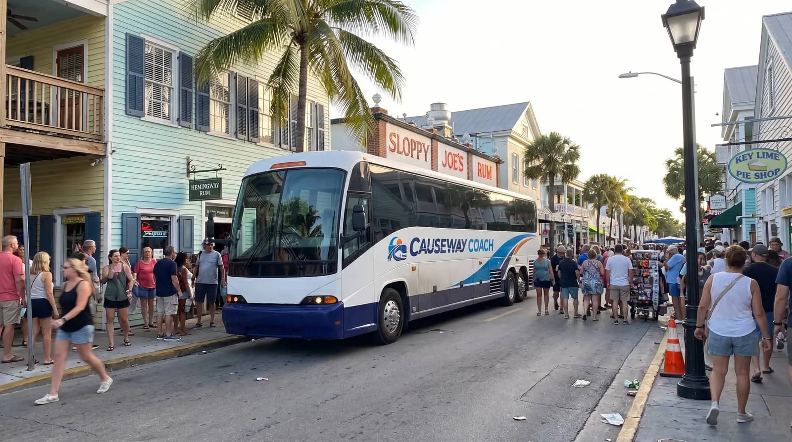 Causeway Coach motorcoach crossing a Florida Keys bridge toward a Key West festival weekend