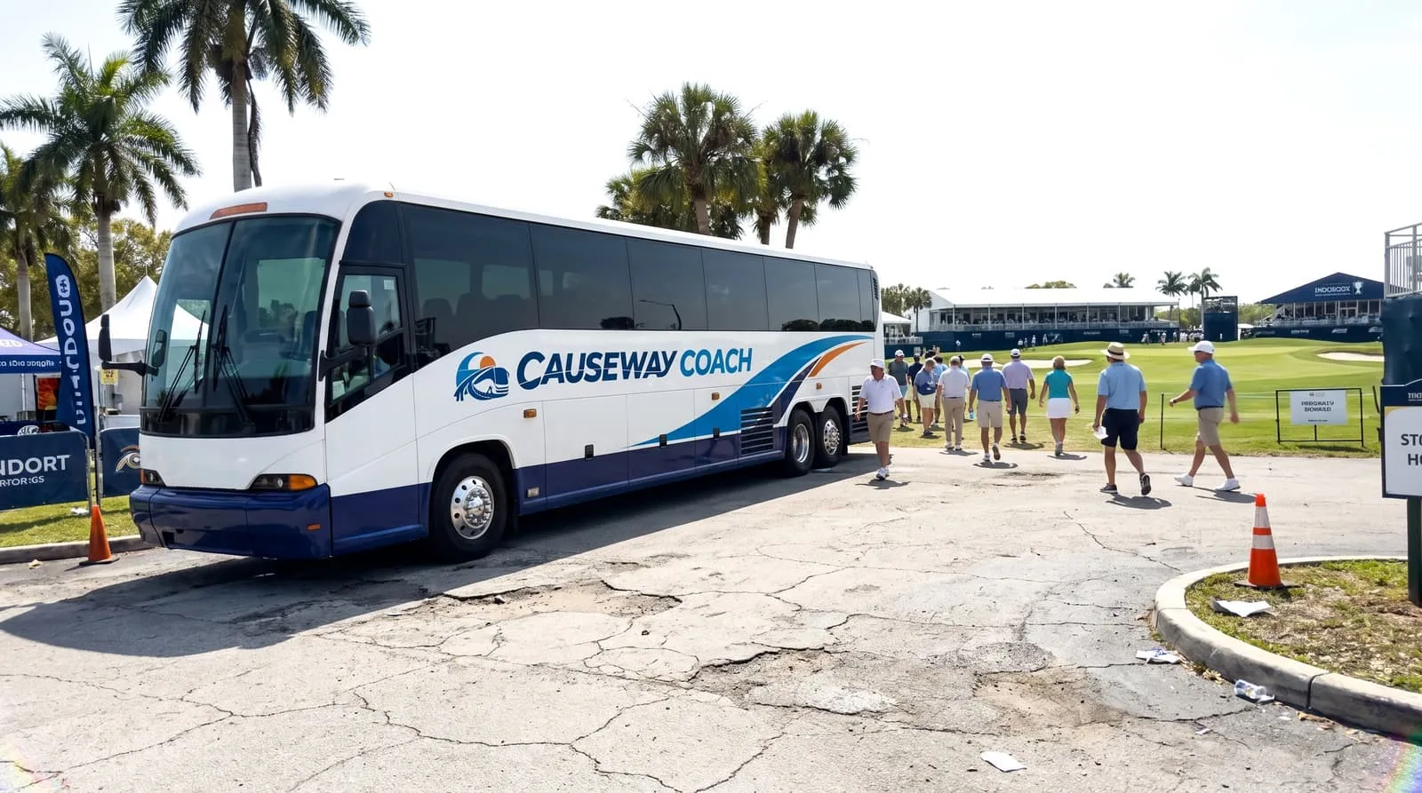 Causeway Coach mid-size coach at a Florida golf tournament hospitality entrance