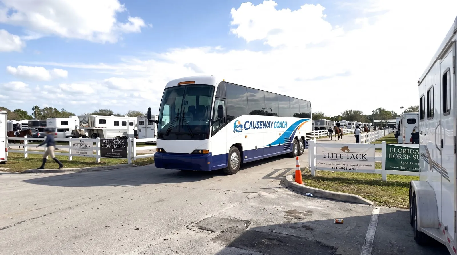Causeway Coach motorcoach at a Wellington equestrian showground entrance during the winter season