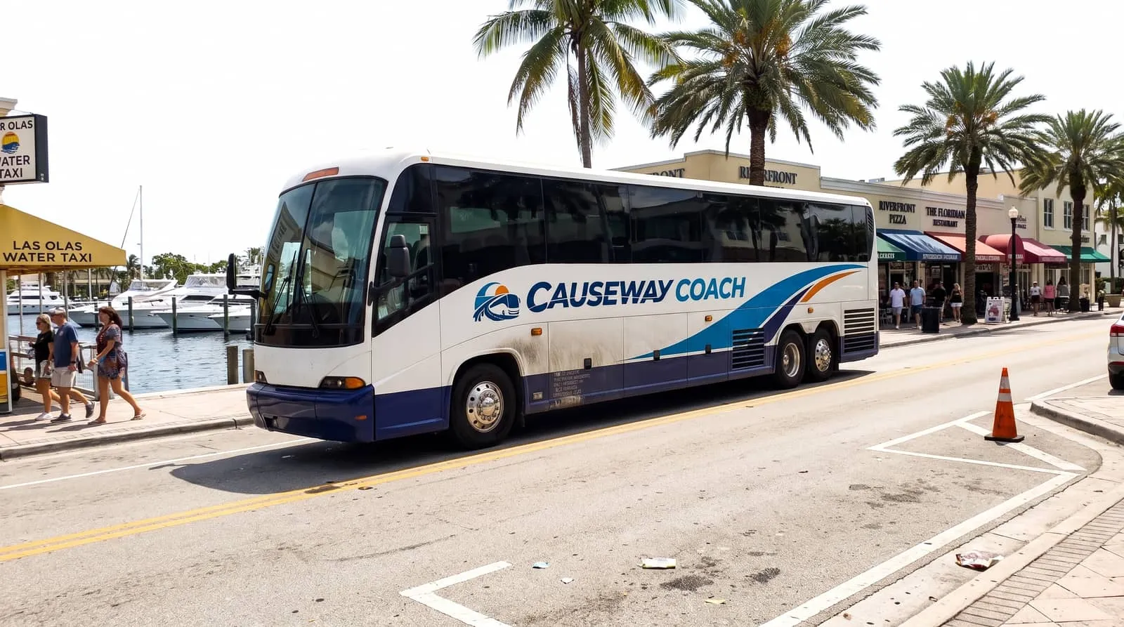 Causeway Coach motorcoach staged at a Port Everglades cruise terminal in Fort Lauderdale on a turnaround morning